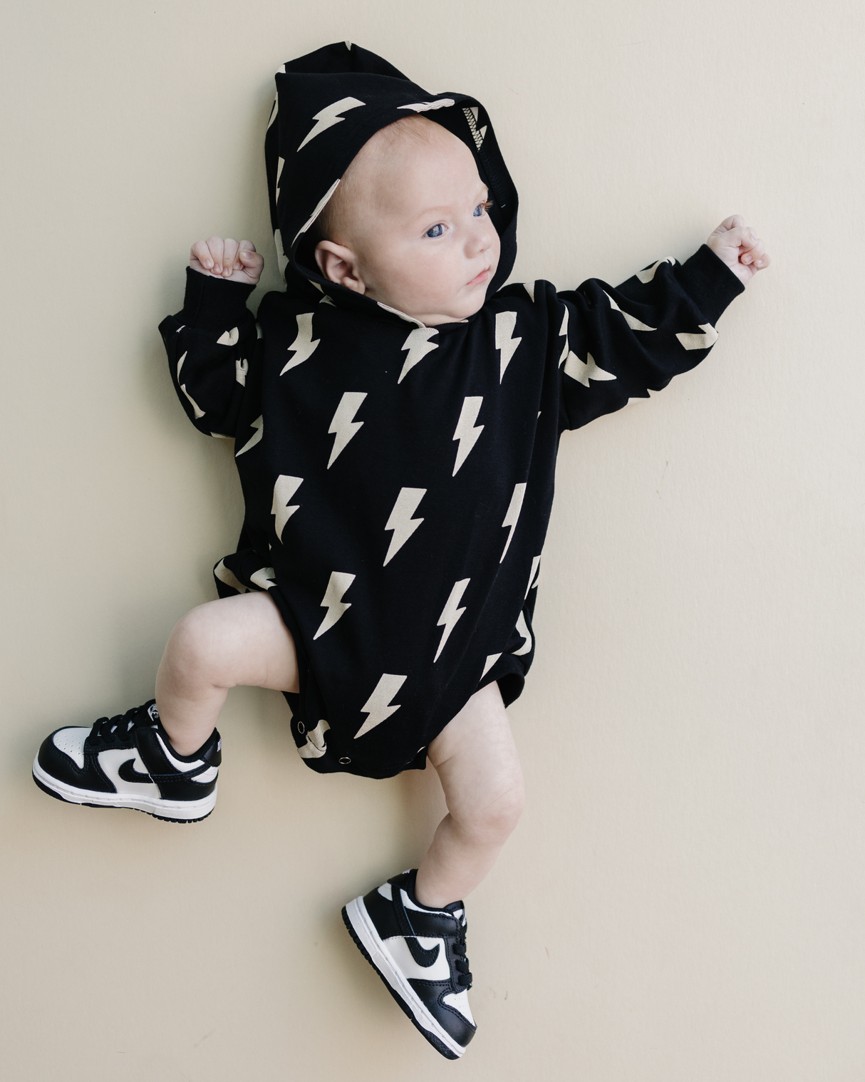 Hooded Bubble Romper | Black Bolts - HoneyBug