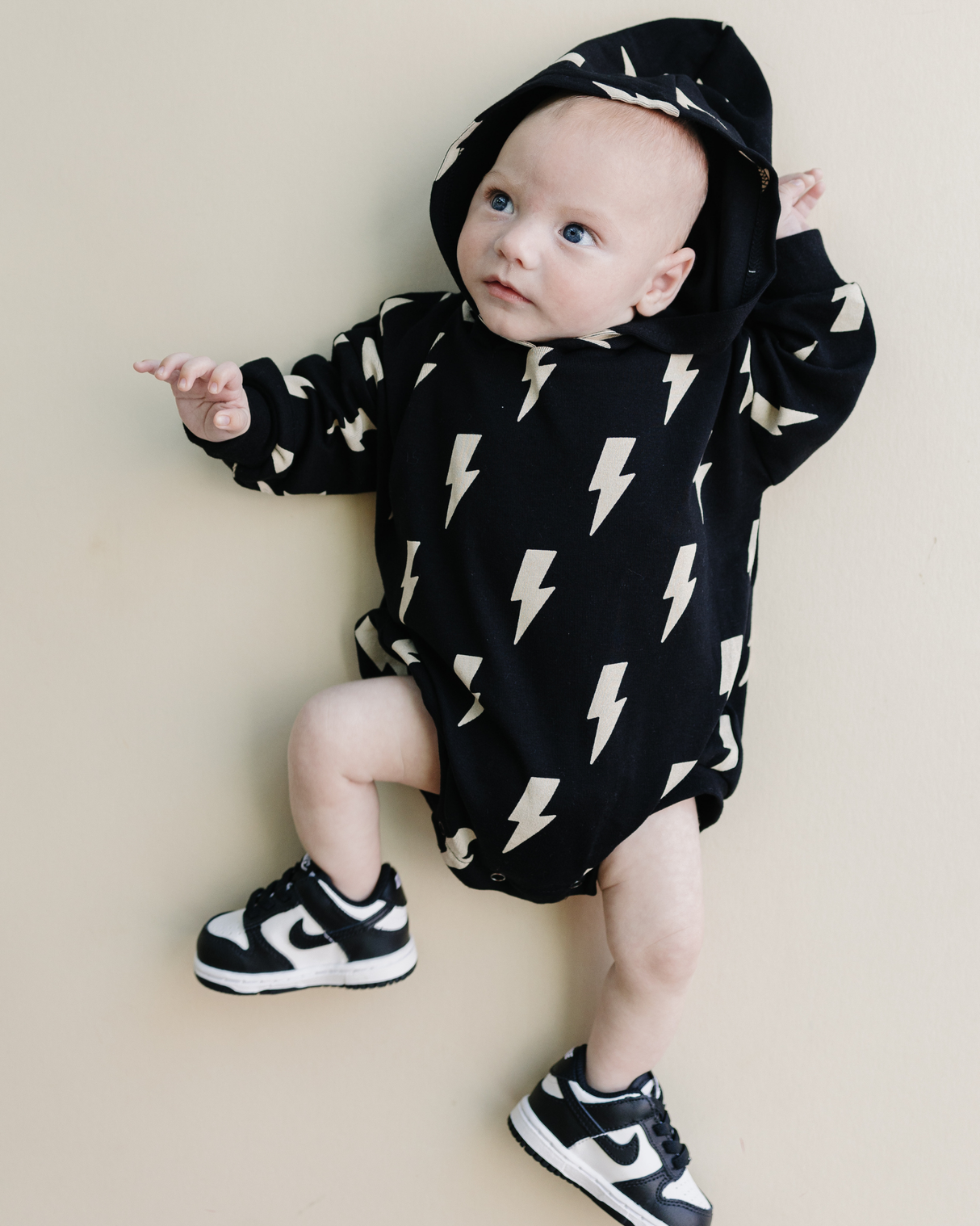 Hooded Bubble Romper | Black Bolts - HoneyBug