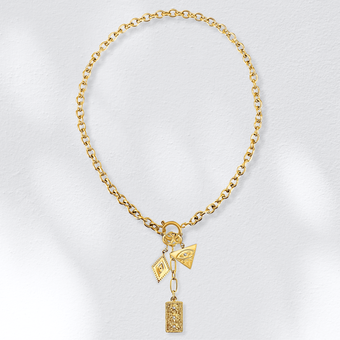 Emryn Geometric Charm - HoneyBug