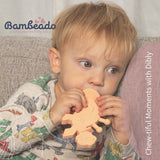 Dibly - Pink - Baltic Amber & Natural Rubber Dinosaur Teether with Toothbrush Tail- - HoneyBug 